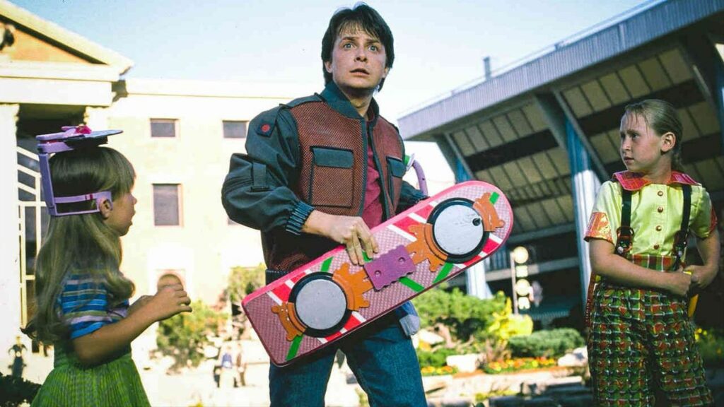 Marty McFly, played by Michael J. Fox, holding a hoverboard in a scene from Back to the Future 2